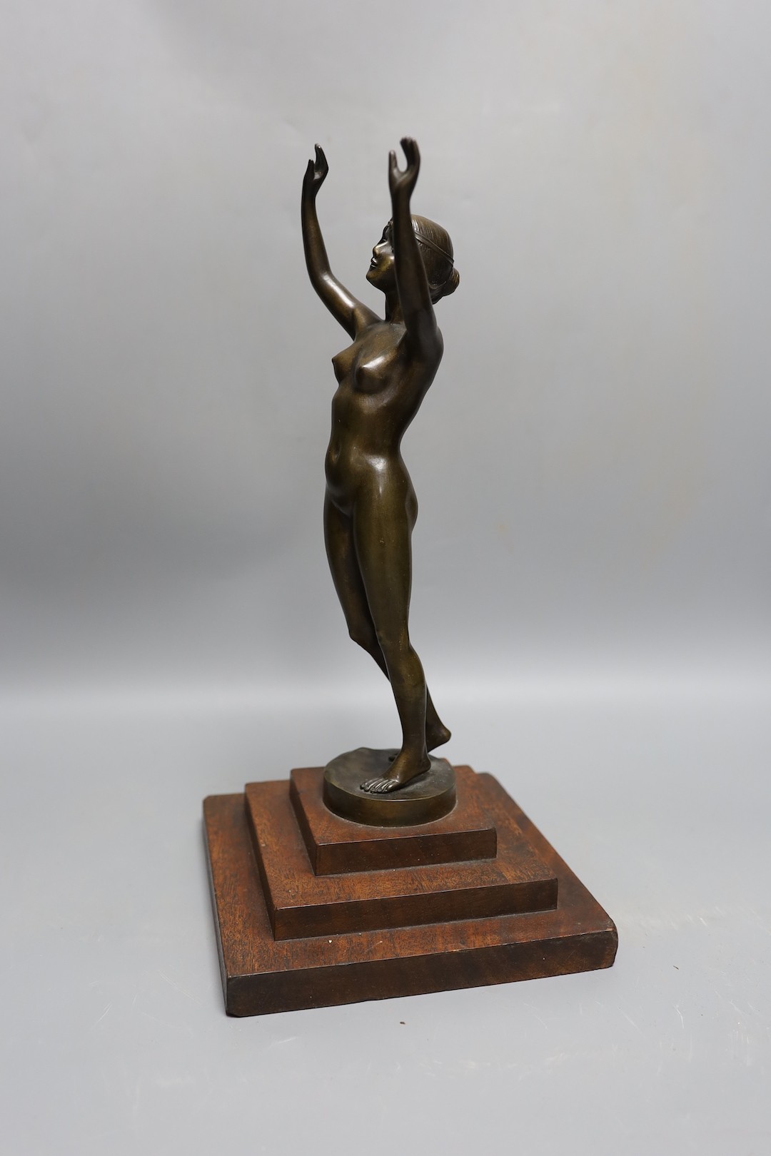 An Art Deco style bronze model of a nude female. 36cm